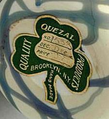 „Quezal Art Glass“ popieriaus etiketės ženklas