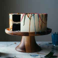 Regenboog chocolade verf splatter cake