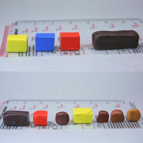 Várias combinações de argila de polímero marrom para comida de casa de bonecas feitas pela mistura de vermelho, amarelo e azul.
