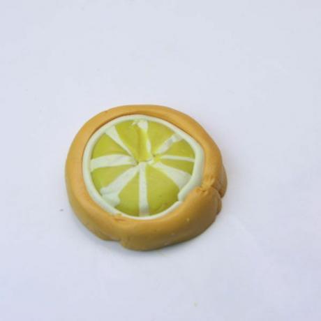 Fatia de limão feita de argila do polímero