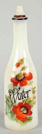 Viktorijos laikų kirpėjo butelis su kamščiu dekoruotas rankomis pieštomis aguonomis ir užrašu „Vanduo“.